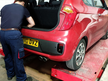 Kia Picanto has rear fog and reverse lights rewired at our workshop Kia Picanto and mechanic